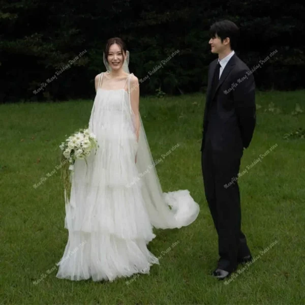 S19c58aaf5ce545c5999d00bb093f38a0v.webp Customized Soft Layered Tulle Floor Length Wedding Dresses Korea Photoshoot Spaghetti Straps Bridal Gown Vestido De Noiva 2025 - Image 1