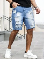 Men's summer blue ripped printed denim shorts. Trendy ripped design. Stylish text prints. - Image 4