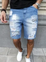Men's summer blue ripped printed denim shorts. Trendy ripped design. Stylish text prints. - Image 3
