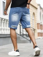 Men's summer blue ripped printed denim shorts. Trendy ripped design. Stylish text prints. - Image 2